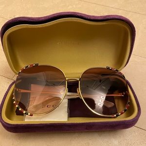 Gold Gucci sunglasses